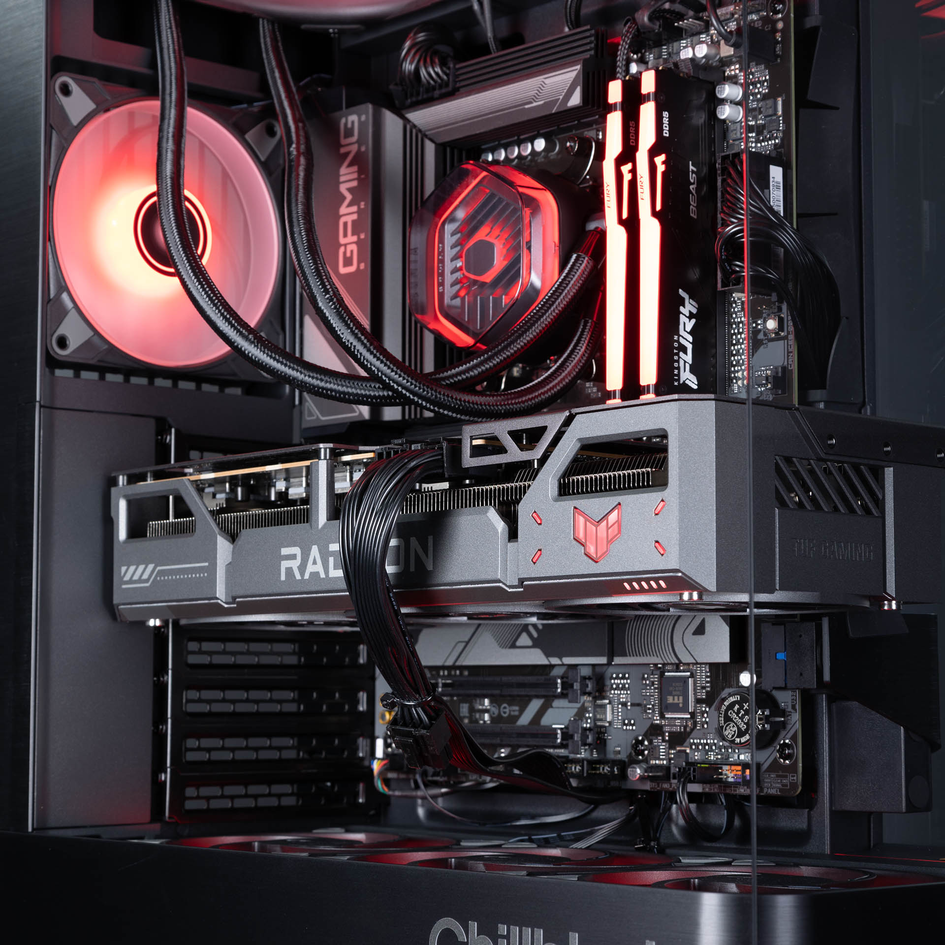 Chillblast Titan RX 9070 Gaming PC with Red RGB Lighting – A high-performance gaming PC featuring an AMD Radeon RX GPU, powerful cooling system, and red LED lighting, housed in a sleek black chassis.