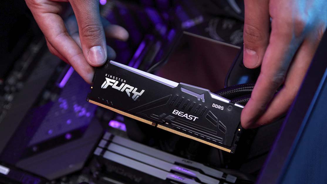 Installing Kingston FURY Beast DDR5 RAM in a PC for fast creative performance.