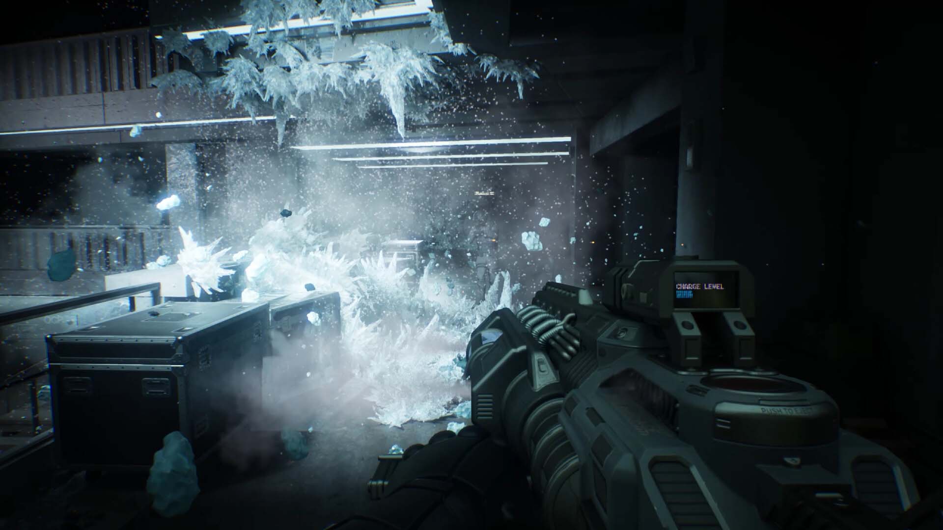 First-person view of RoboCop firing the Cryo Cannon, freezing a room in a blast of ice shards and frost as the weapon's charge level is displayed on screen.