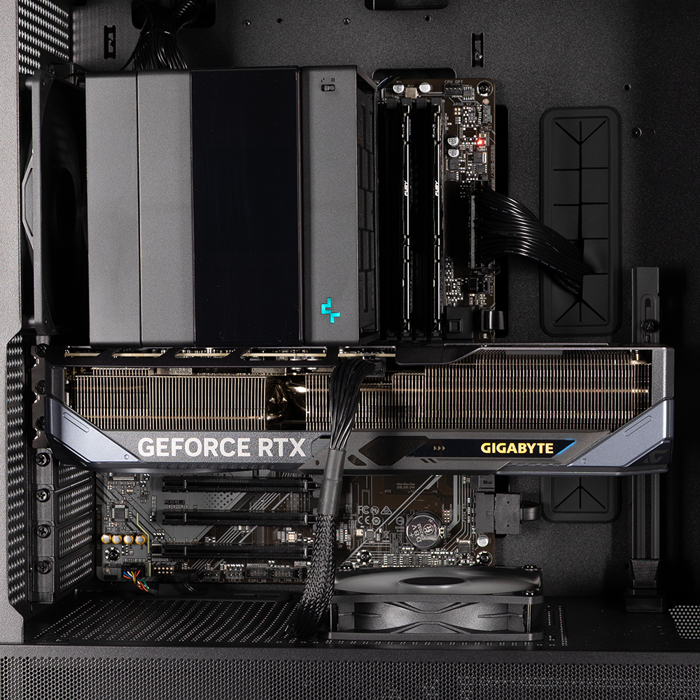 The B850 motherboard installed in the case, with the CPU cooler, RAM and video card also installed