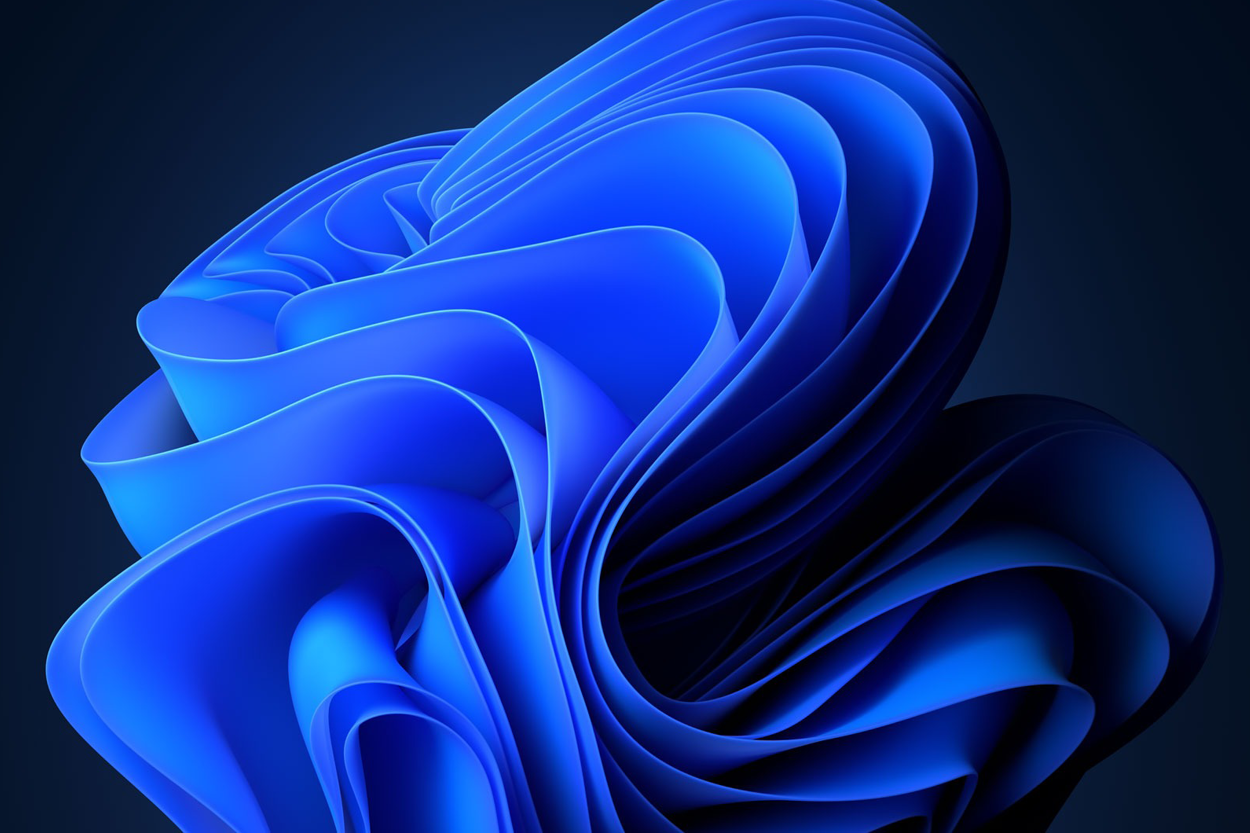 Windows 11 logo blue swirls on a black background