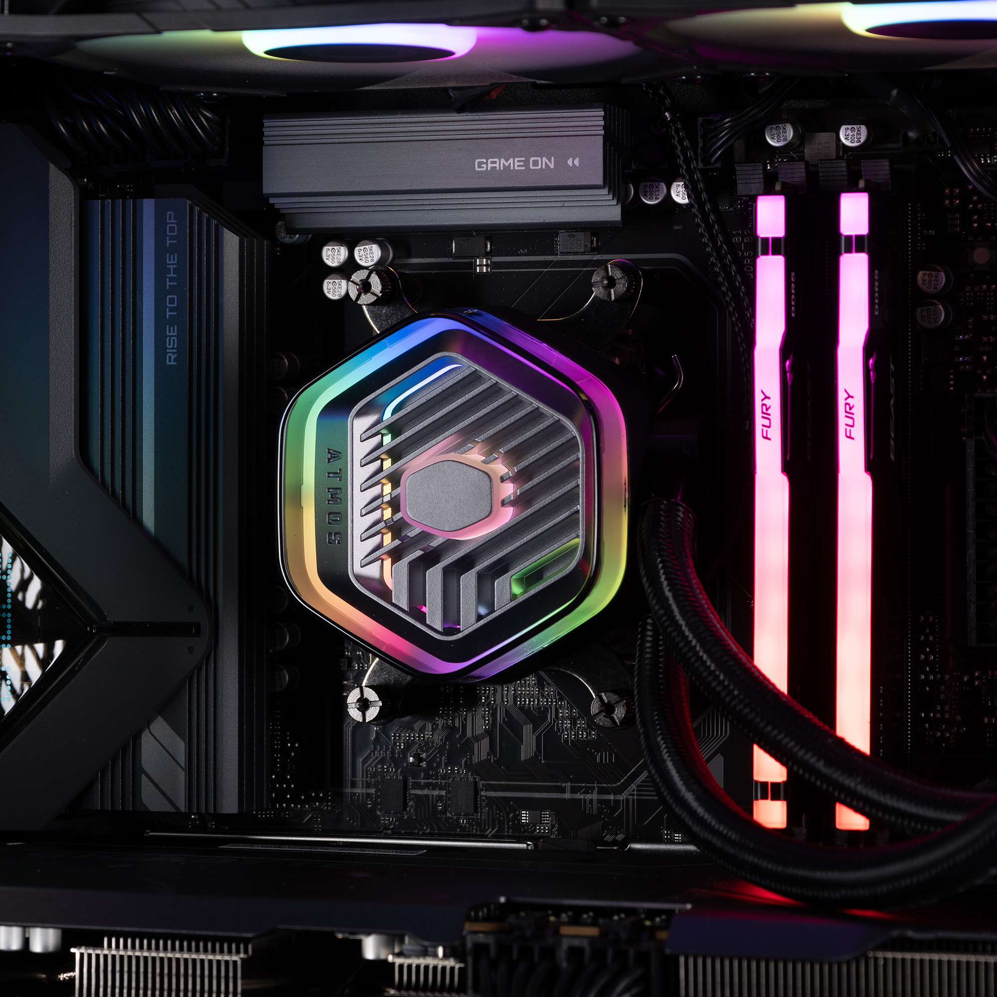 The memory inserted into a motherboard, next to the CPU block