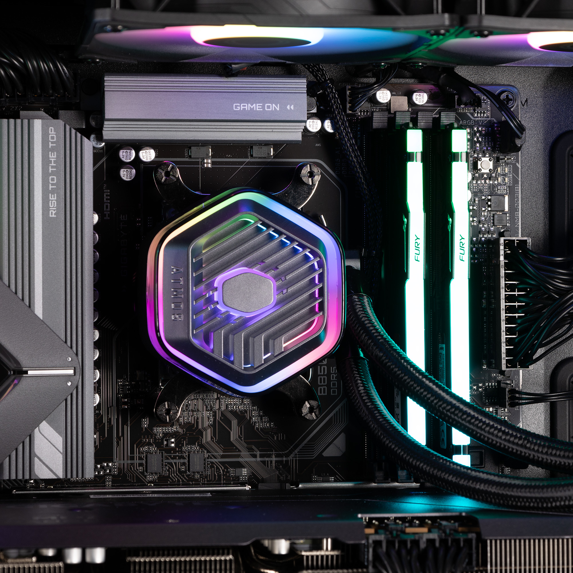 The CPU cooling block attached to a motherboard