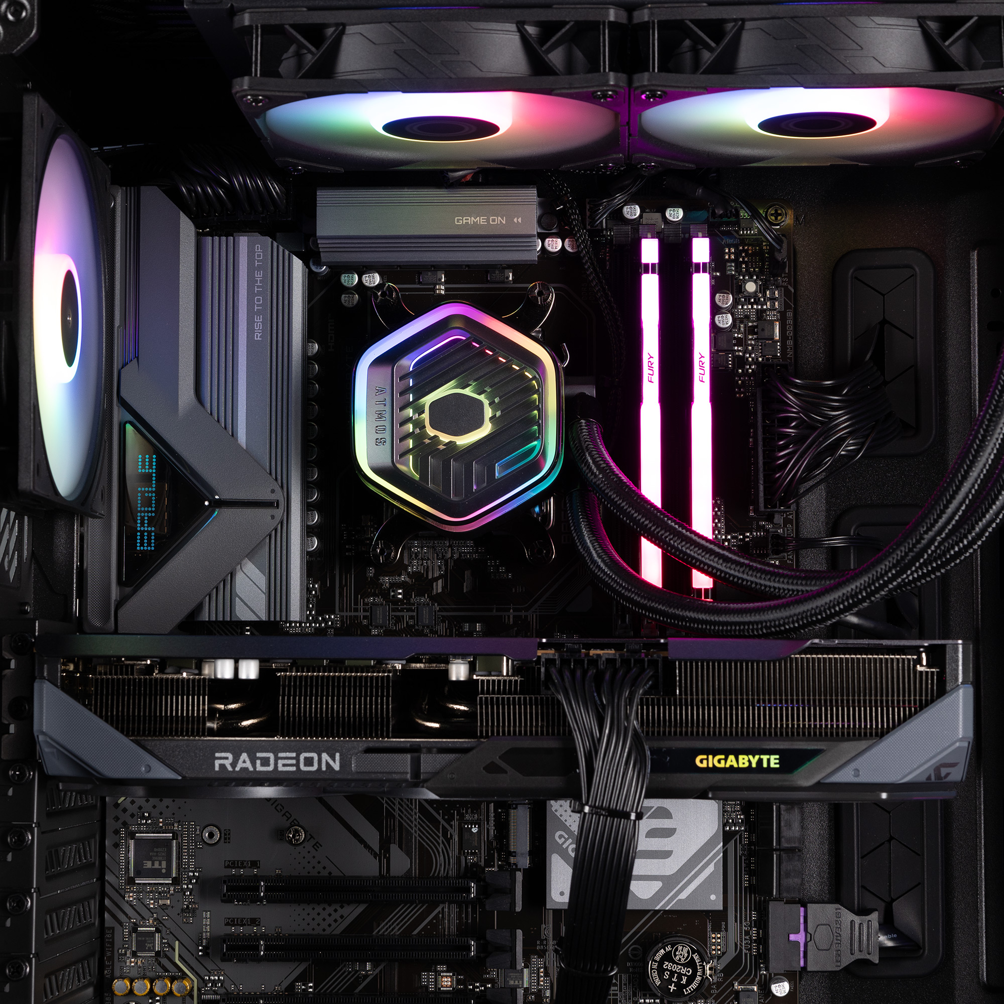 A B850 motherboard with a graphics card, memory and CPU block attached