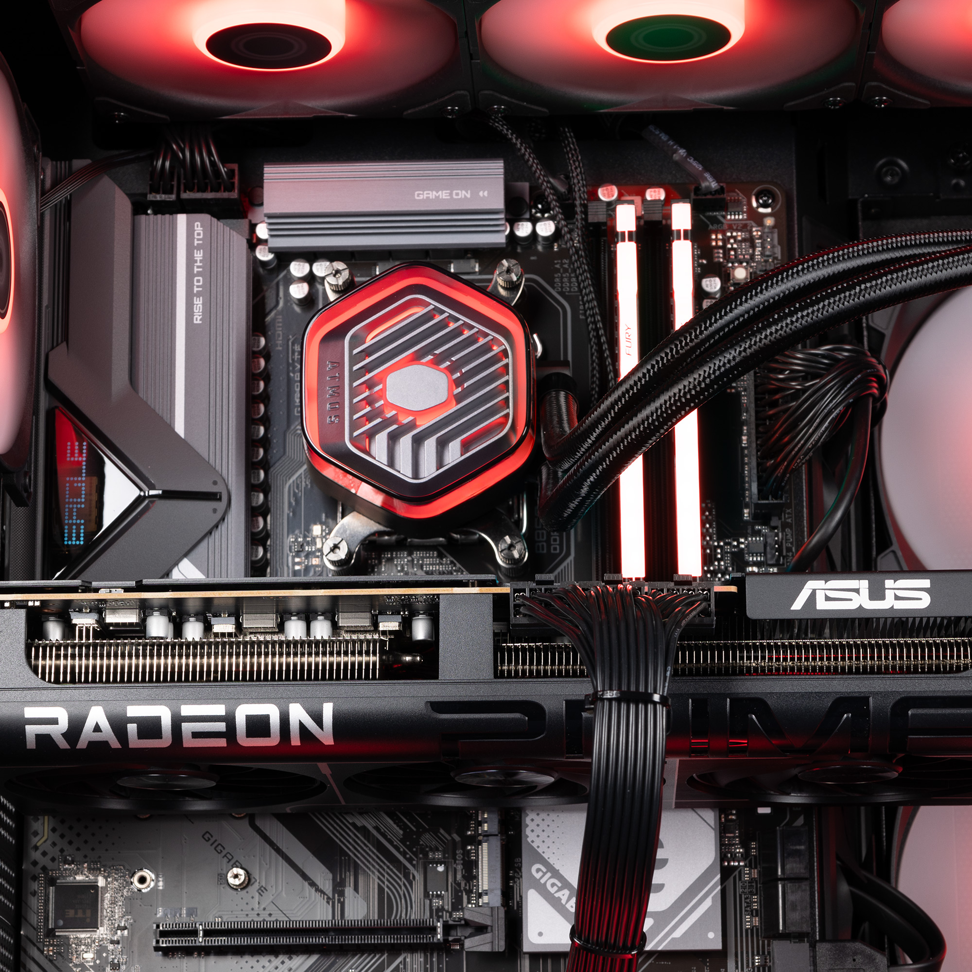 A B850 motherboard installed in a PC with a GPU, RAM and CPU attached