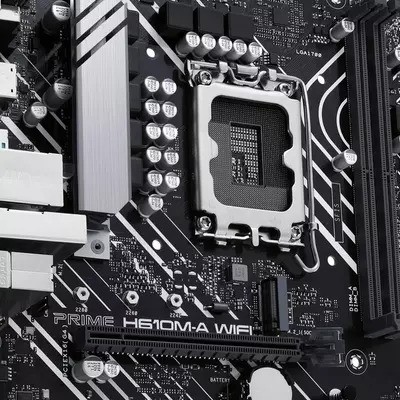 Close-up of the ASUS Prime H610M-A WiFi motherboard, showcasing the CPU socket, heatsinks, and detailed circuit design, emphasizing the high-quality components used in Chillblast PCs.