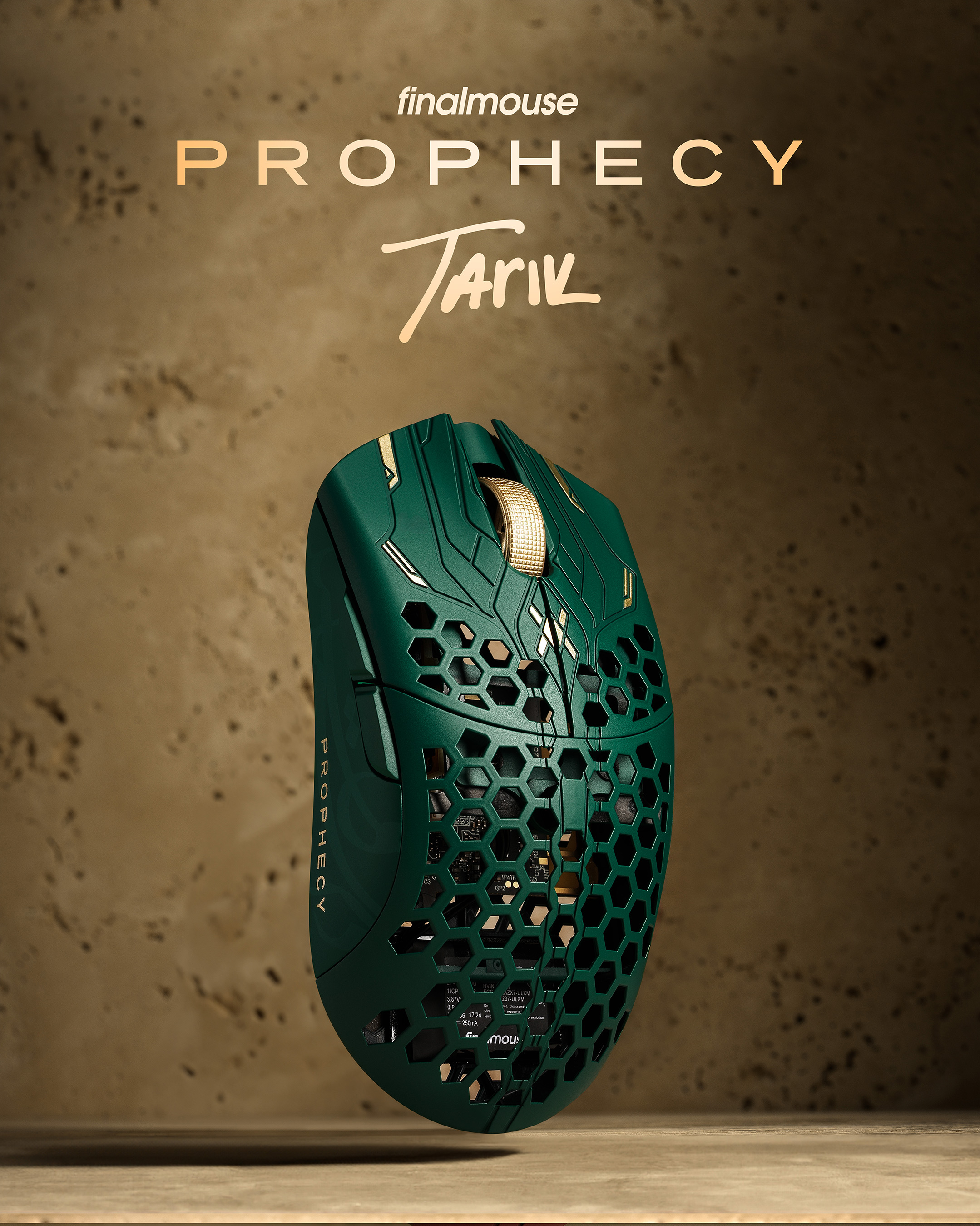 A green UltralightX Prophecy mouse against a sandstone background