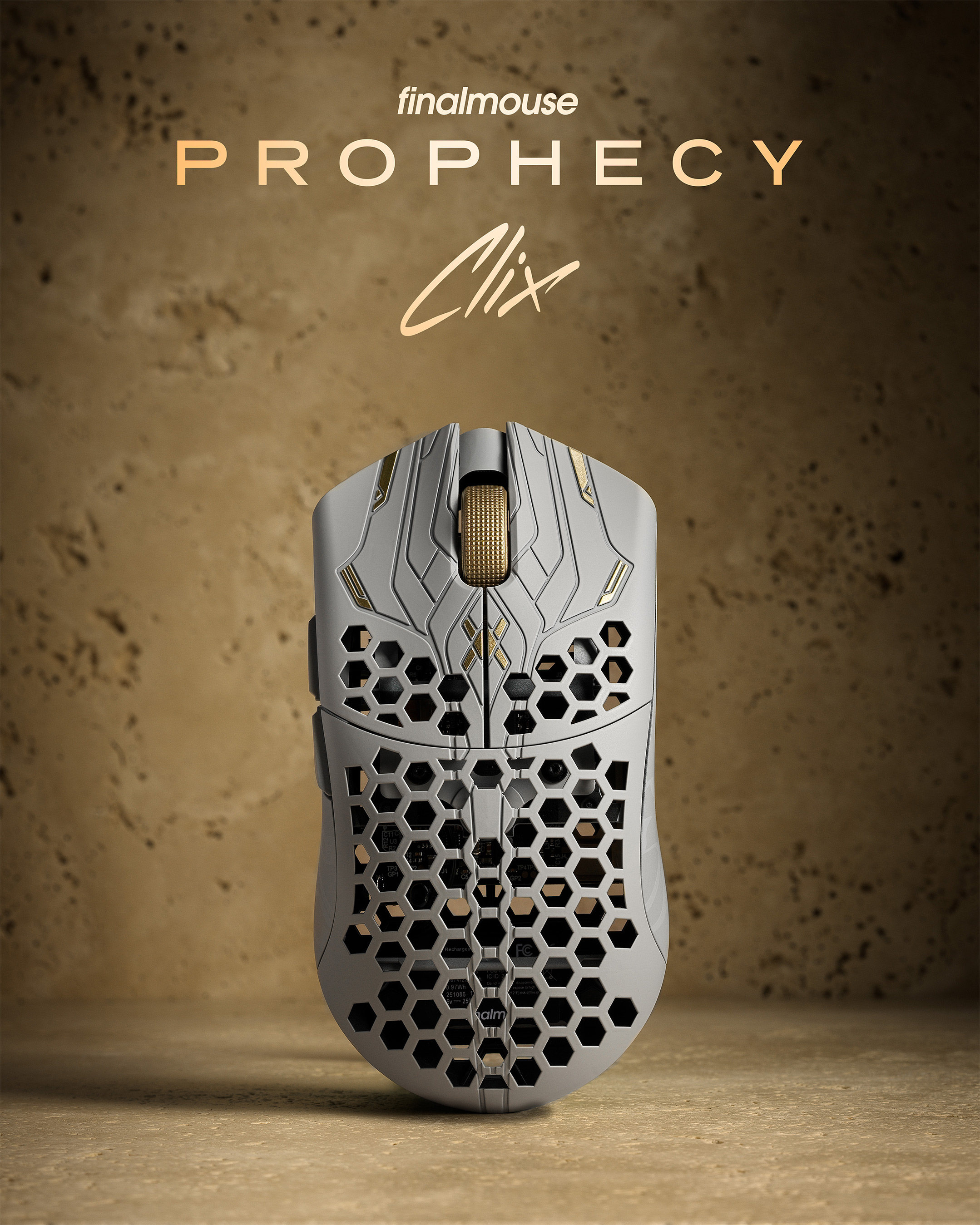 A white UltralightX Prophecy mouse against a sandstone background