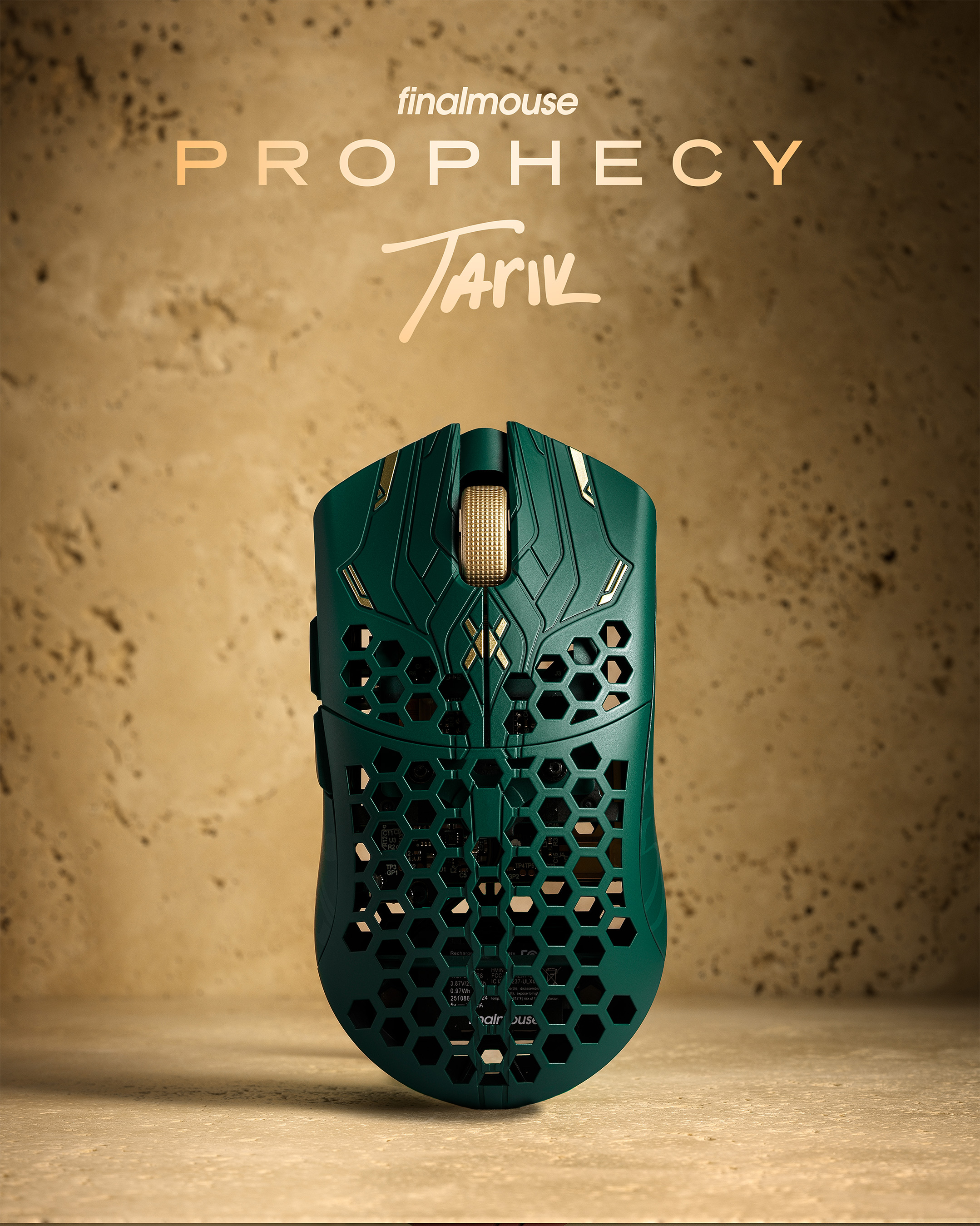 A green UltralightX Prophecy mouse against a sandstone background